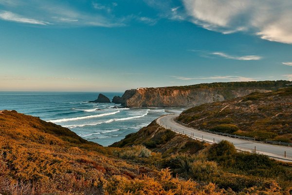 How do you choose between the coast and the interior of Portugal?